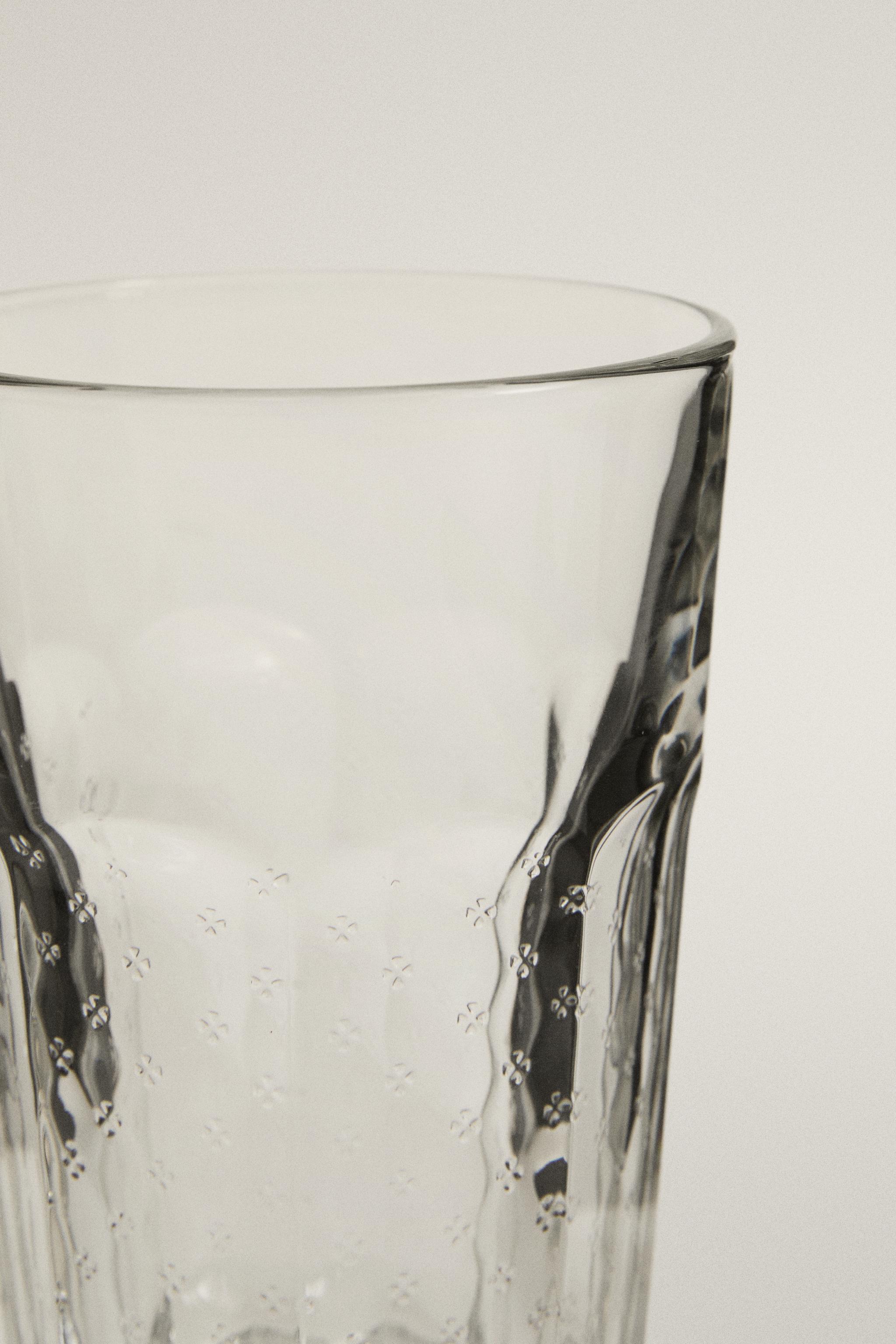 RAISED FLORAL DESIGN GLASS TUMBLER
